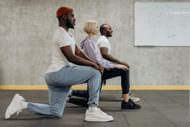 Lateral lunges help in stretching hamstrings. (Image via Pexels/ Mikhail Nilov)